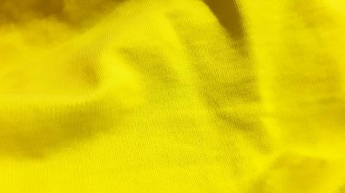 Sarı, parlak, ışık yüzeyi. Arkaplan tasarımı, fotoğrafçılık. Tekstil, kumaş şablonu, modern yeni