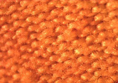 Açık modern kumaş. Kumaş parçası, detaylı tekstil. Mikroskop altında görüntü, mikro fotoğrafçılık. Bilim, eğitim ve eğitim. Çoklu yakınlaştırma, yakın çekim. Yeni bilimsel fotoğrafçılık