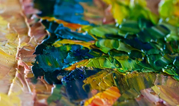 Pattern depicting a close-up oil painting with yellow, blue and green strokes