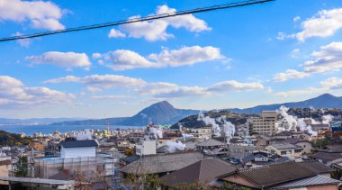 View of Beppu city and Bay-a small resort town in Oita Prefecture on the Japanese island of Kyushu. clipart