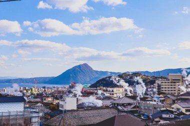 View of Beppu city and Bay-a small resort town in Oita Prefecture on the Japanese island of Kyushu. clipart