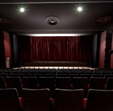 3 boyutlu görüntü kırmızı koltuklu bir tiyatronun içinden alındı 