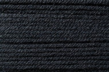 soyut kumaş dokusu arkaplanı siyah renk ipliğinin resmi, tekstil yüzey duvar kağıdı şablonunun makro resmi afiş web sitesi poster şablonu