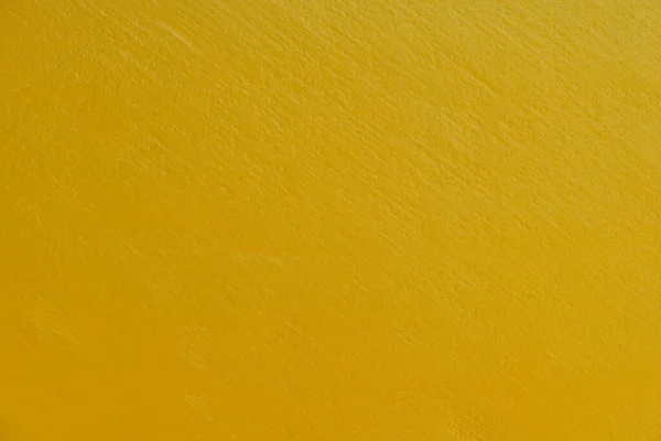 金の質感の背景 コンクリート壁のテクスチャ塗料 デザインのための金の色の表面ブランク — ストック写真
