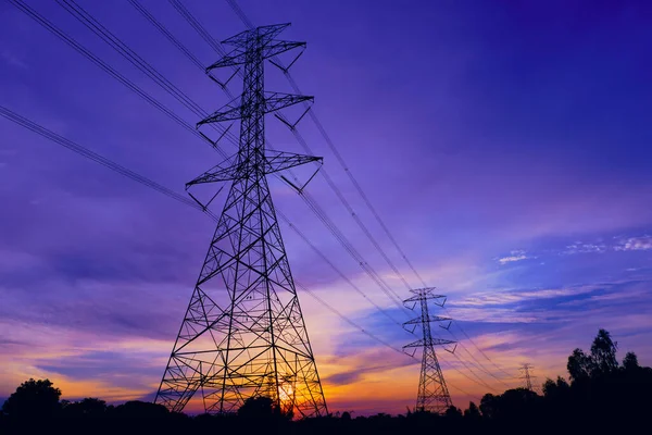 High Voltage Electric Transmission Tower Energy Pylon Hintergrund Des Sonnenuntergangs — Stockfoto