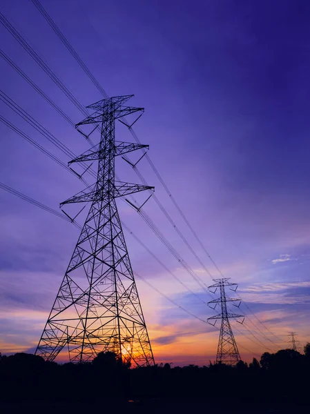 High Voltage Electric Transmission Tower Energy Pylon Hintergrund Des Sonnenuntergangs — Stockfoto