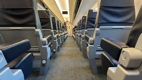 Empty seats in a luxury class of a train.