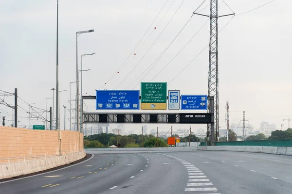 Jerusalem direction sign on Highway 1 in Tel Aviv, Israel Blue road sign for Ben Gurion Airport Exit to the first highway. High quality photo