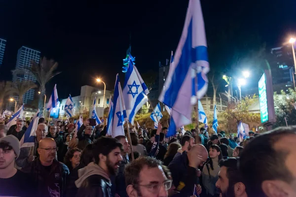 TEL AVIV, ISRAEL - January 21, 2023: Israelis protest in Tel Aviv against plans by prime minister Benjamin Netanyahu new government to trample the legal system and the supreme court. High quality