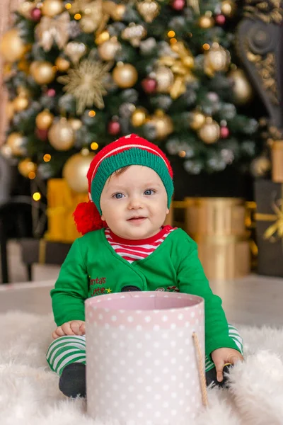 Cute Little Boy Dressed Elf Opens Christmas Present Decorated Christmas — Stock Photo, Image