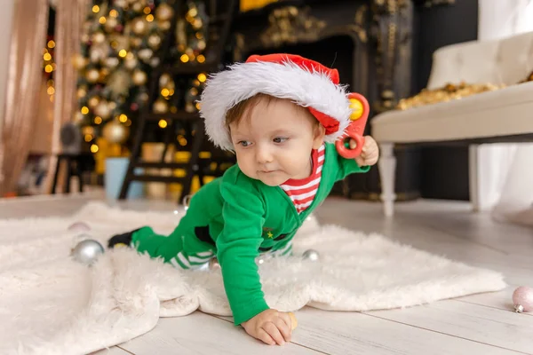 Cute Little Boy Dressed Elf Opens Christmas Present Decorated Christmas — Stock Photo, Image