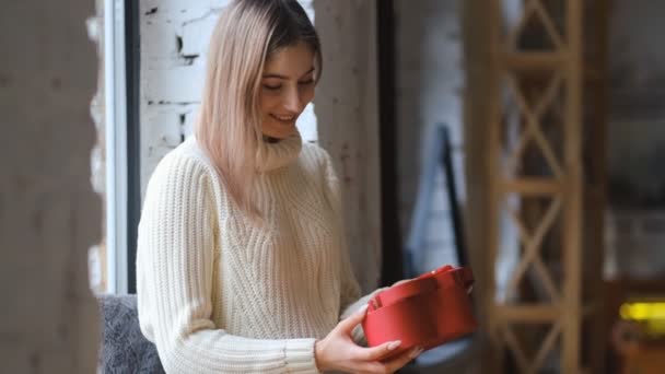 Young Beautiful Blonde Opens Gift Valentine Day Woman Opens Red — Vídeo de Stock