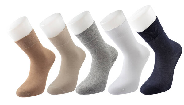 Multicolored socks set in different designs, Knitted knee high socks. High resolution photo isolated on white background.