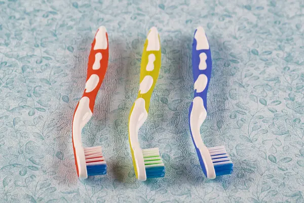 Plastic Toothbrushes Color Background — Stock Photo, Image