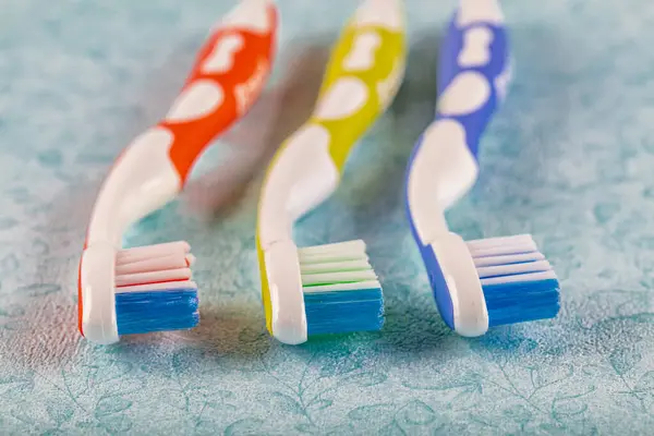 Plastic Toothbrushes Color Background — Stock Photo, Image