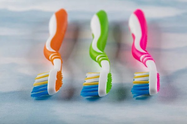 Plastic Toothbrushes Colorful Handles Color Background — Stock Photo, Image