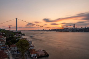 Istanbul Bosphorus Bridge at sunset. 15 July Martyrs Bridge. Sunset view from Beylerbeyi. Istanbul, Turkey Long Exposure.