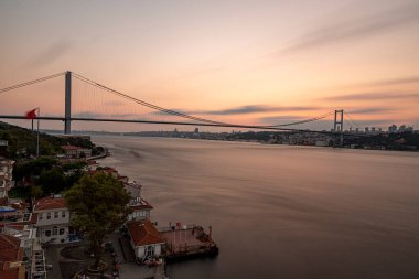 Istanbul Bosphorus Bridge at sunset. 15 July Martyrs Bridge. Sunset view from Beylerbeyi. Istanbul, Turkey Long Exposure.