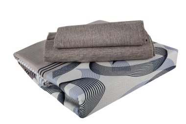 Linens set. Bedding set isolated on white. Set with stacks of clean bed linen on white background. Banner design.