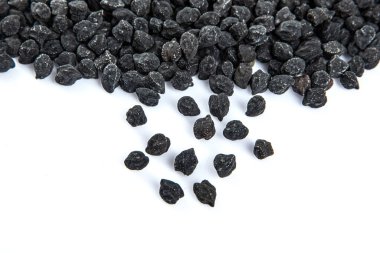Black ceci neri chickpeas are very healthy to be consumed with their high fiber content. Heap of black Ceci neri chickpeas, black chickpea flour in a bowl with on white background.