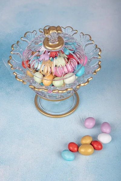 Almond candies.Colorful candies in glass bowl served with tea; almond sweets. Sugar Feast, (Feast of Ramadan) Ramadan concepts.
