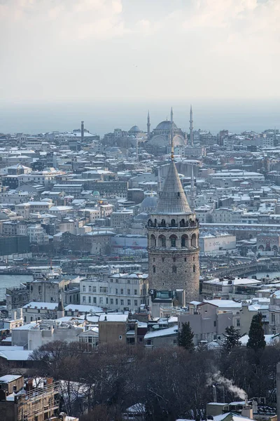 stock image Galata tower in Istanbul, Turkey. Aerial view of landmark at golden hour with beautiful sunlight. Snow and winter season view in Istanbul Suleymaniye Mosque and Galata tower.