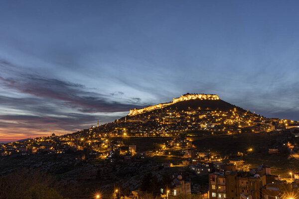 The city of Mardin, Turkey. Besides its stone houses and historical texture, Mardin impresses tourists with its night view. Long exposure high quality photo.