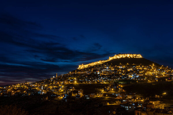 The city of Mardin, Turkey. Besides its stone houses and historical texture, Mardin impresses tourists with its night view. Long exposure high quality photo.