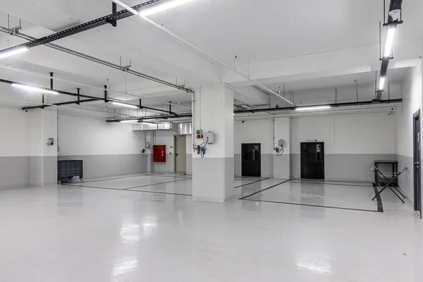 Automotive workshop, service station. New car repair center. Interior of empty car dealership. Auto Service Parking.