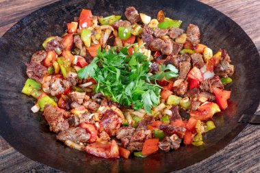 Meat Saute Turkish et sote with wood table - Hair Pie Meat - Sac Tava - Sac Kavurma
