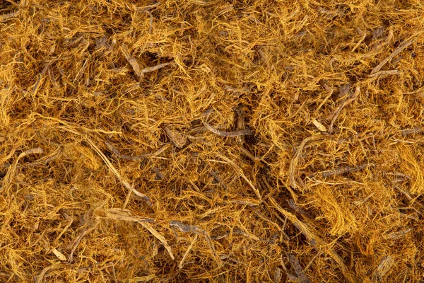 リコリス根と繊維のテクスチャーされた背景 グリスクリリザグラブラ 白い背景に分離された乾燥した有機液体の根 グリスクリラザグラハ マクロ クローズアップ トップビュー — ストック写真