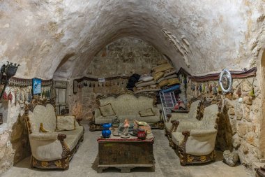 Mardin, Midyat, Turkey - 9 Ocak 2024; Matiate Underground City Estel Caves. Underground city in Mardin Midyat. The old settlement known as Midyat caves is open to visitors today. clipart