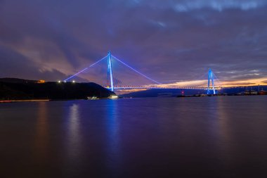 Yavuz Sultan Selim Bridge in Istanbul, Turkey in evening illumination. 3rd Bosphorus Bridge night view from Poyraz.