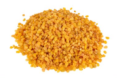 Sultani üzümleri. Kurumuş altın üzüm arka planı. Kurutulmuş sarı kuru üzüm yığını. Organik altın üzüm dokusu.