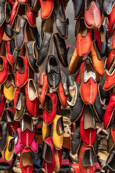 stock image Traditional turkish leather shoes named yemeni. Colorful handmade leather slipper shoes displayed on the street market in Turkey.