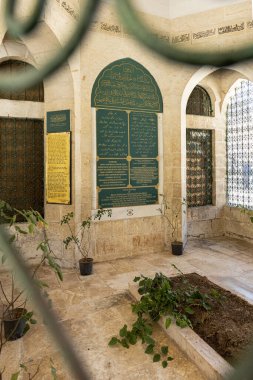 Sanliurfa, Turkey August 4, 2024; Said Nursi Bediuzzaman grave in the courtyard of Khalilur Rahman mosque, Mevlid-i Halil Mosque. The place where he was first buried.  clipart