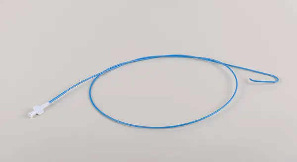 stock image Angiographic Catheter (Cardiac Heart Catheter). Angioplasty guiding catheter(AL-2 catheter) used to treat blockages of the arteries of heart.