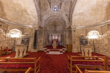 Mardin, Turkey, January 10, 2024; Syrian Orthodox Church dedicated to Holy Mary in the village of Anitli known also as Hah, Mardin, Turkey .Historical mardin midyat virgin mary church. clipart