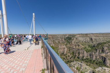 Ulubey, Usak, Turkey July 1, 2023;  Ulubey Canyon glass terrace. Famous place in Turkey travel. Tourists watch the canyon. Ulubey, Usak, Turkey. clipart