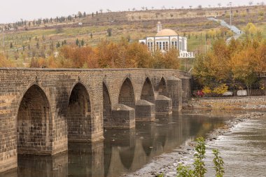 Historic ten-eyed bridge view (on gozlu kopru), Dicle Bridge, Diyarbakir, Turkey. A view of the historical Diyarbakir Ten-eyed Bridge.