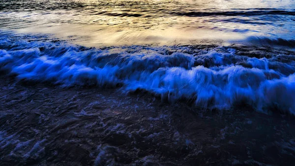 Blue water background. Ripple sea ocean water surface. still calm sea ocean water surface. close up blue water surface at deep ocean. Light blue background