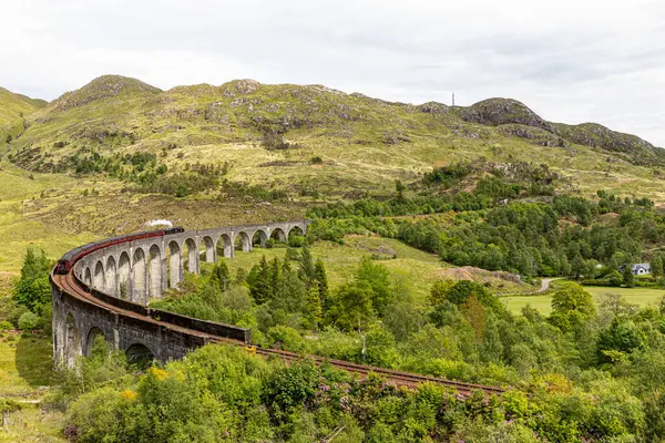 stock image June 2, 2022. Glenfinnan Scotland, United Kingdom. Mountain landscape . View of the railway viaduct.