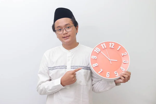 Portrait Young Atraktive Asian Muslim Man Pointing Holding Clock Shows — Stok Foto