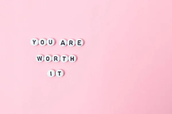 Top View You Worth Quotes Made Out Beads Pastel Background — Stock Photo, Image