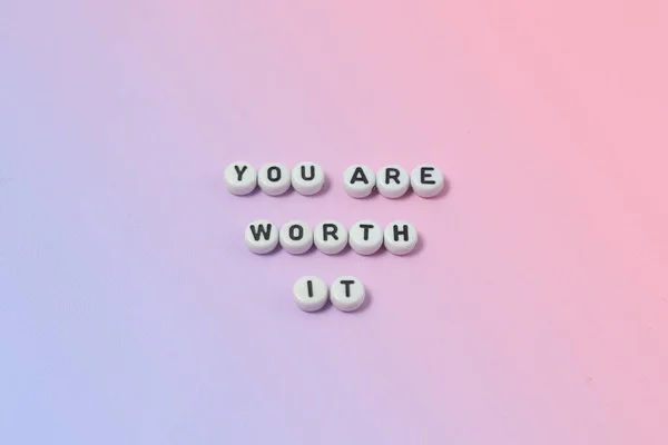 Top View You Worth Quotes Made Out Beads Pastel Background — Stock Photo, Image
