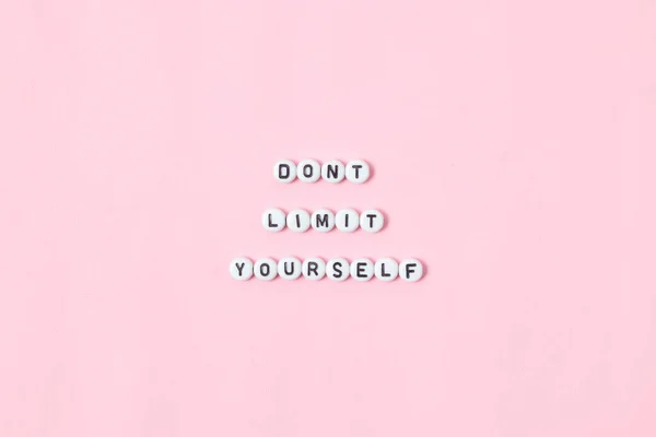 Top View Don Limit Yourself Quotes Made Out Beads Pink — Stock Photo, Image