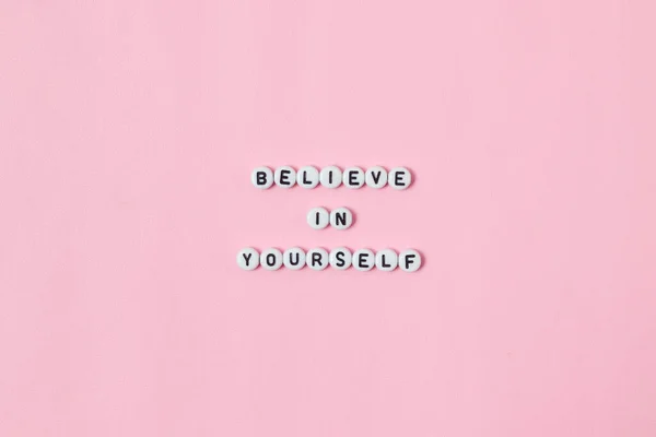Top View Believe Yourself Quotes Made Out Beads Pink Background — Stock Photo, Image