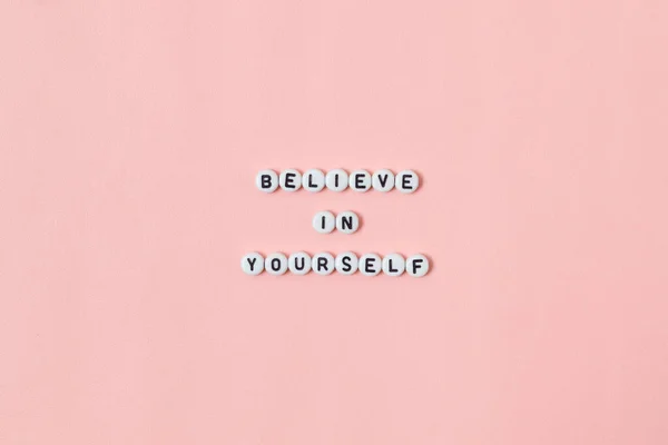 Top View Believe Yourself Quotes Made Out Beads Pink Background — Stock Photo, Image