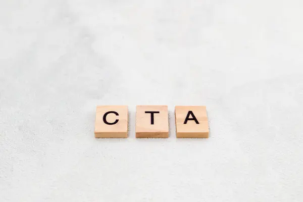Top view of CTA letter or (Call To Action) on wooden cube letter block on white background. Business concept