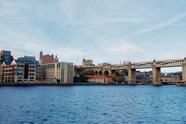 Newcastle UK:29th Oct 2024. River Tyne famous bridges on sunny winter afternoon during golden hour. High Level Bridge. Autumn colours enhance the scenery clipart